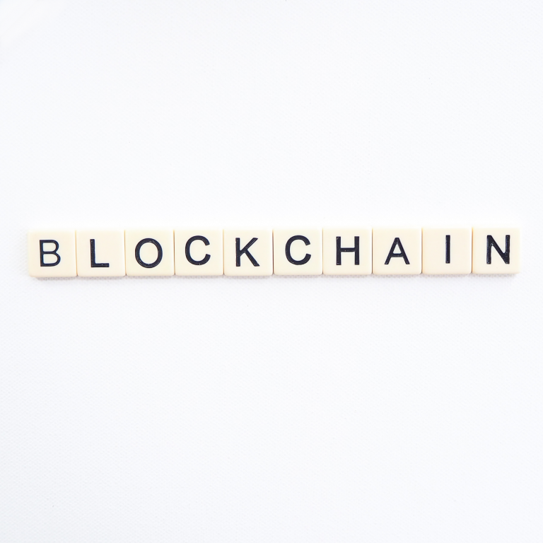 The word blockchain is written with the letters of Scrabble.