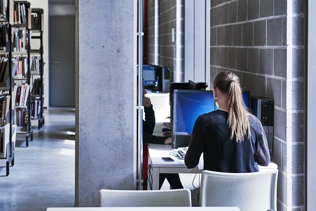 Student in a university library